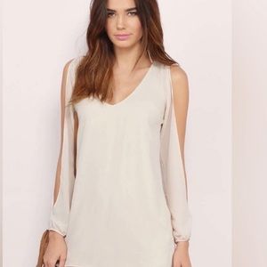 Mini dress with long slit sleeves